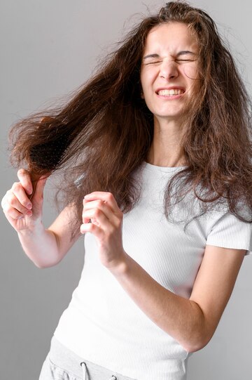 woman-struggle-brush-hair_23-2148547424